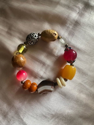Bracelet like new with colorful elements including wood