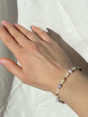 Coquette bracelet handmade with pearls and purple glass beads made to order