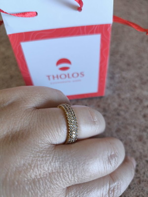 Ring with zircon stones new, gold color, stainless steel