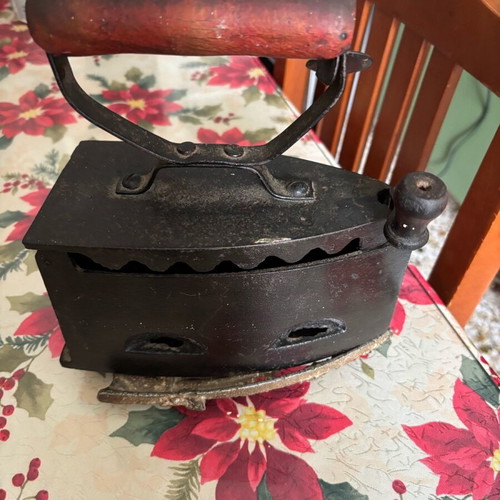 Iron with base and charcoal used