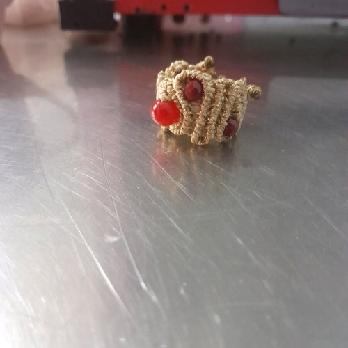 Macrame ring made to order with gold-colored thread and red stones