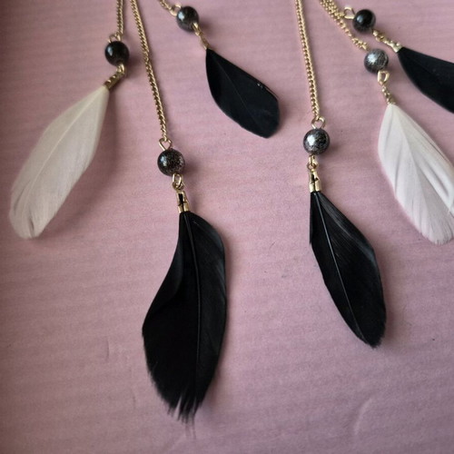 Boho feather dangle earrings like new, black and white