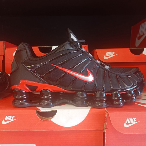 Nike Shox athletic shoes new, black and gold
