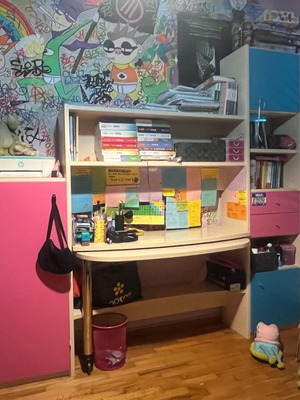 Desk with bookshelf used and large storage space