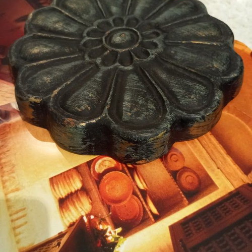Metal table used with ceramic decoration and antique finish