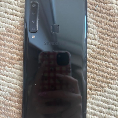 Samsung Galaxy A9 used with case and 4 screen protectors