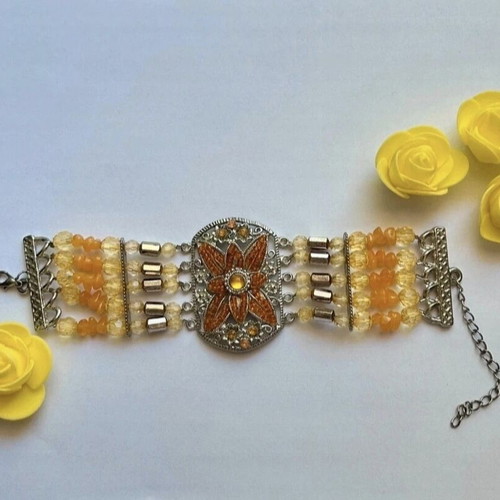 Bracelet used with floral design and colorful beads