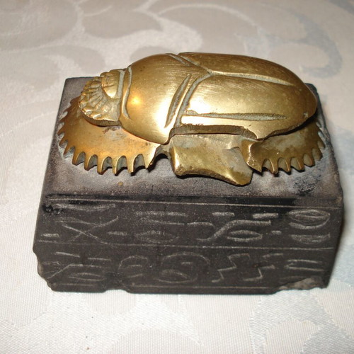 Egyptian bronze decorative scarab used with black hieroglyph base
