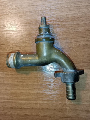 Vintage bronze faucet used