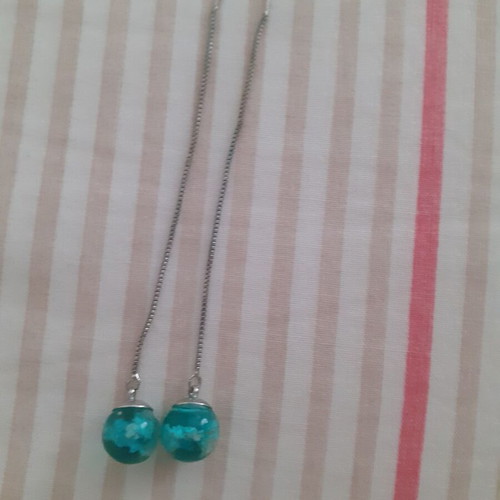 Dangling earrings new with blue sky design made of resin
