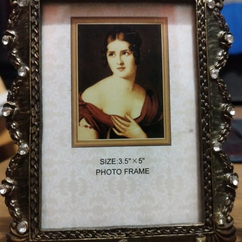 Vintage frame set like new with embossed designs and rhinestones