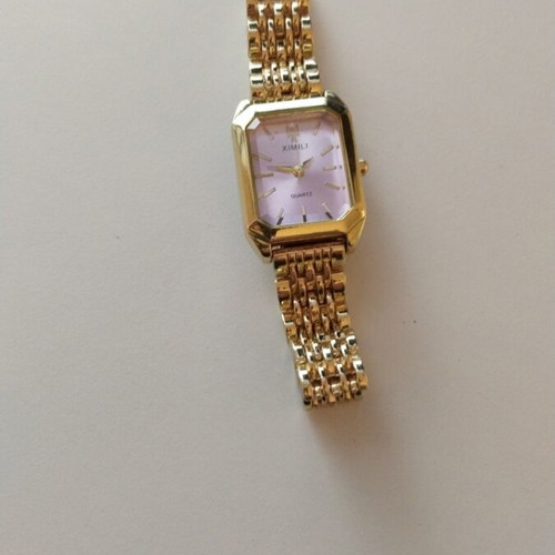 Quarts women's watch gold color like new