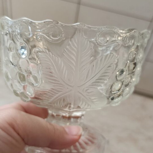 Vintage glass compote with foot and embossed grape design like new