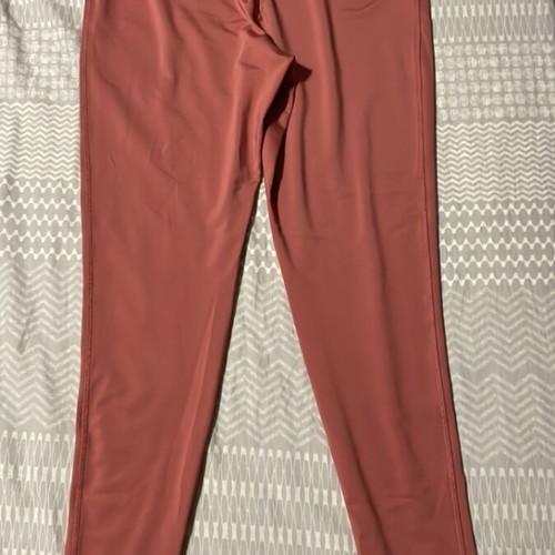 Women's pink gym leggings used, size M
