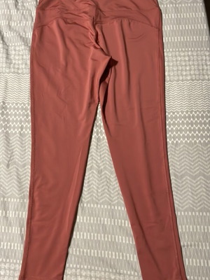 Women's pink gym leggings used, size M