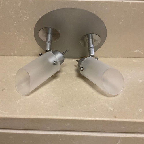Metal ceiling light with two rotating opaline heads