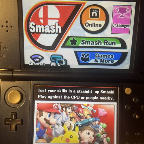 Nintendo 3DS New XL console with charger and Monster Hunters case