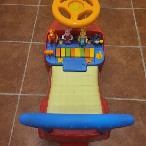Winnie the Pooh ride-on car with sounds and storage