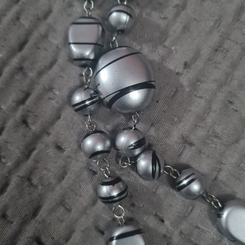 Women's necklace new, long with silver elements and dark stripes