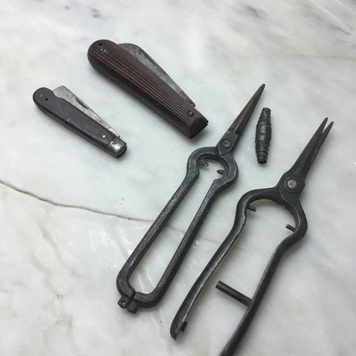 Vintage agricultural tools with grafting knife, farmer's pocket knife and pruning shears
