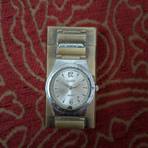 Vintage lighter with integrated quartz watch used