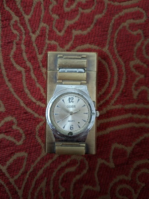 Vintage lighter with integrated quartz watch used