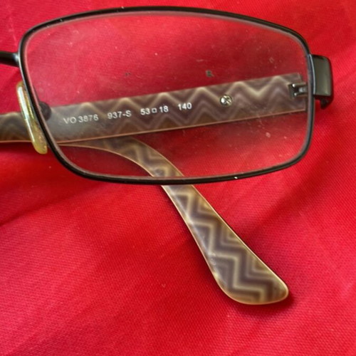 Vogue eyeglass frame like new with black and printed design