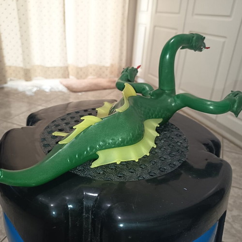 Playmobil car and dragon used with many damages