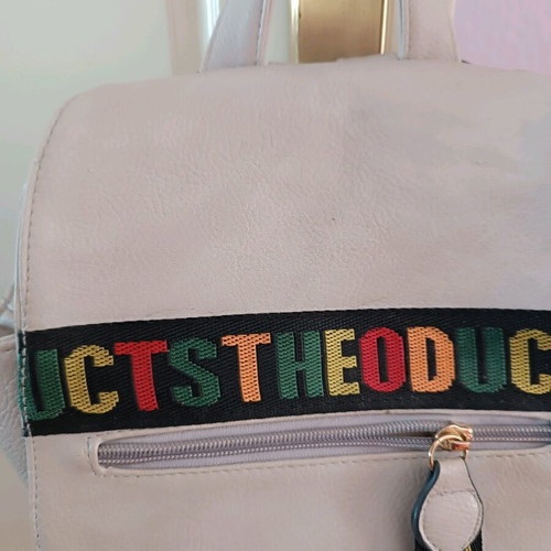 Backpack like new, light gray color