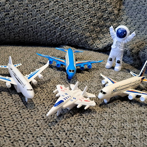Plastic airplane set, spaceship and astronaut used