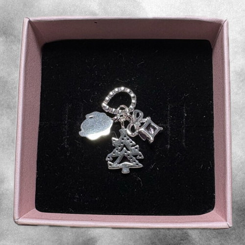 Pandora Holiday Cheer Charm like new, white and multicolor