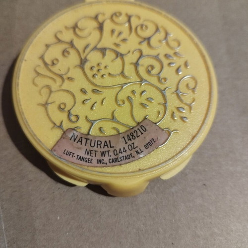 Powder compact from the 60s like new, yellow plastic with gold designs