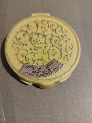 Powder compact from the 60s like new, yellow plastic with gold designs