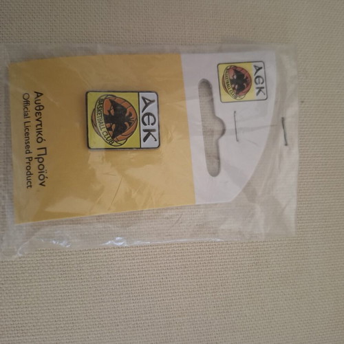 AEK pin and keychain new, authentic collectible