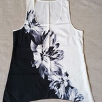 Sleeveless blouse size M, black and white with floral print