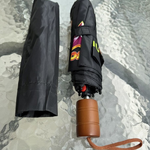 Folding umbrella new, black with colorful print and brown handle