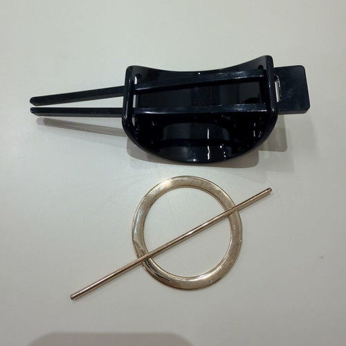 Zara hair sticks set, one black plastic and one gold metal