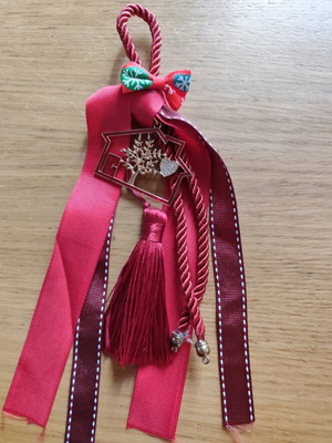 Handmade red - gold good luck charm like new