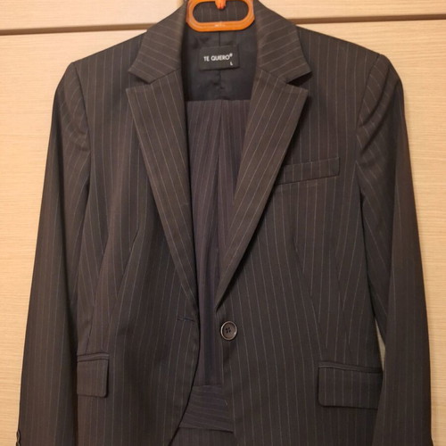 Women's suit like new, black with thin white pinstripe