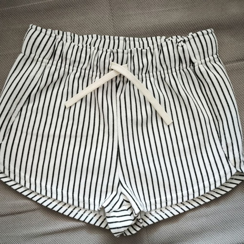 Y.F.K. girls' shorts size 146-152, black and white
