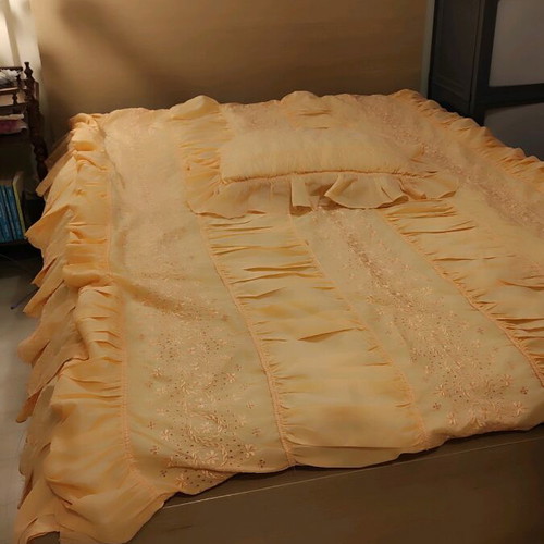 Retro silk quilt with ruffles and matching pillow, salmon color