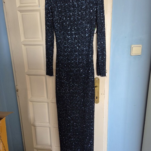 Official dresses in blue-green and black-gold XL, others S