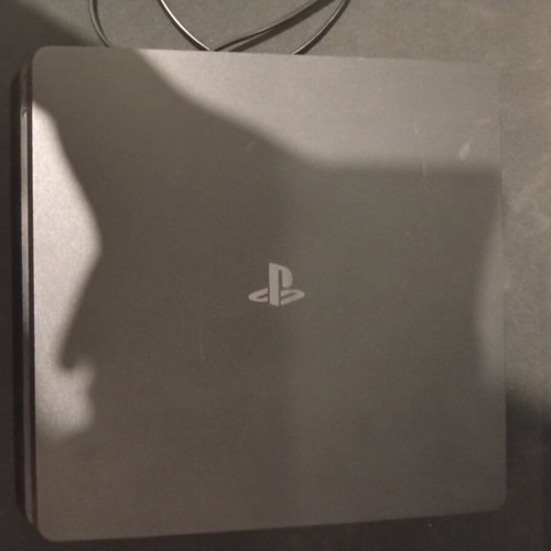 PlayStation 4 Slim 500GB like new with cable