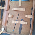 Skin and nail care tools set in small brown case