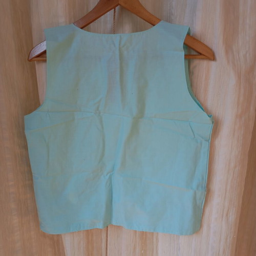 Vintage sleeveless blouse like new, turquoise green, size M