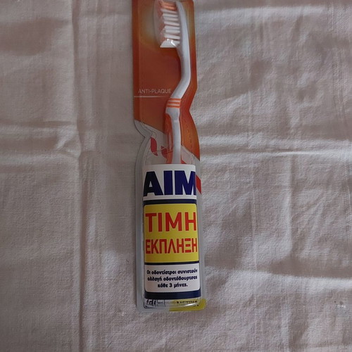 Aim toothbrush medium new