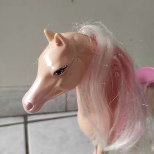 Toy horse for girl used, height 25 cm length 27 cm