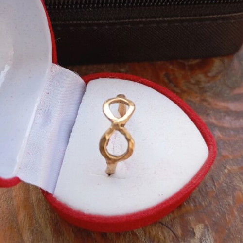 Gold infinity ring like new, made of steel
