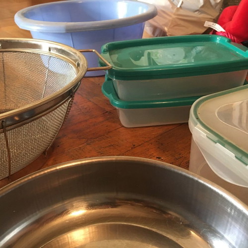 Kitchen items used, tupperware, strainer, basin