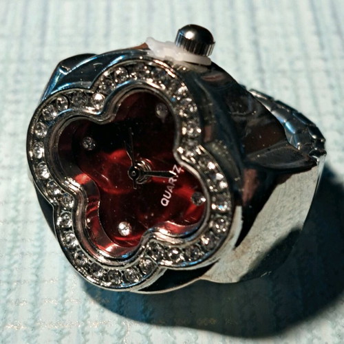 Four-Leaf Clover Ring like new with crystals, quartz watch and red dial